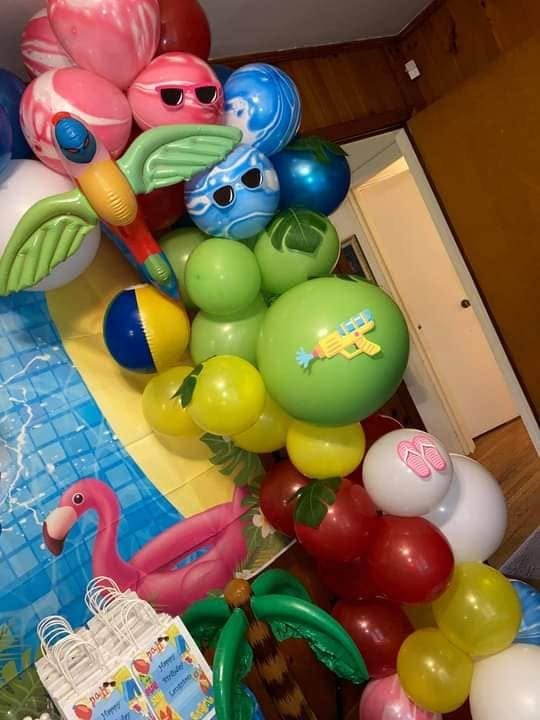 Pool party balloon garland with flamingo, palm and water gun accents